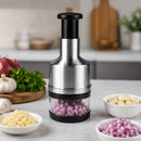 Triturador manual de alimentos em aço inoxidável 304 para picar alho, cebola, legumes, ervas e temperos com sistema de pressão.